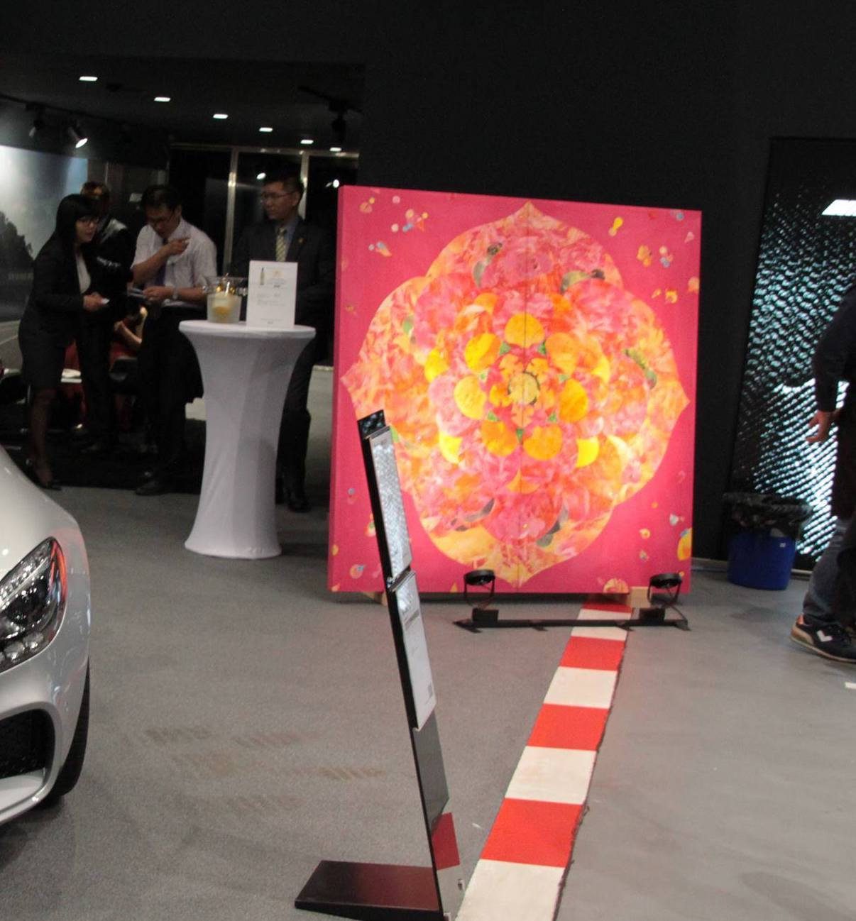 Mineral paintings on easels at the Mercedes-AMG launch showroom