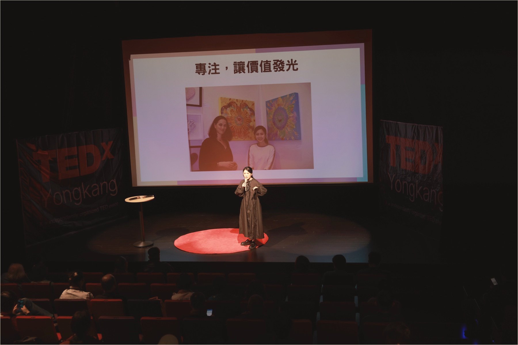 The TEDxYongkang auditorium, Ku Chi-Chun on stage