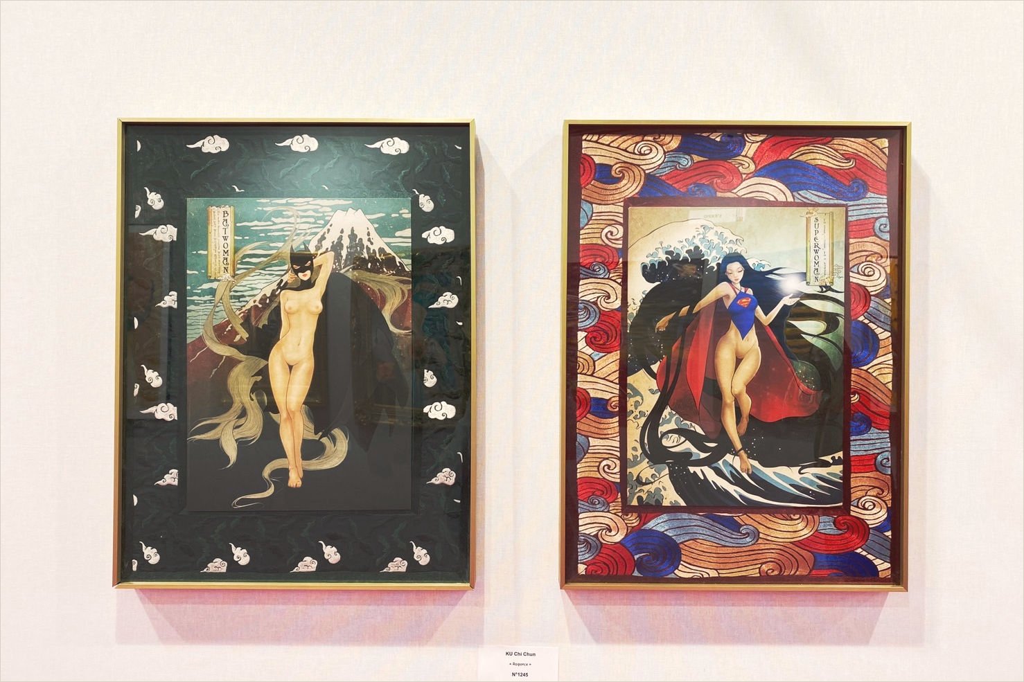 Two framed Heroine works hung side by side on a white gallery wall with their wall label, Art Capital, Paris